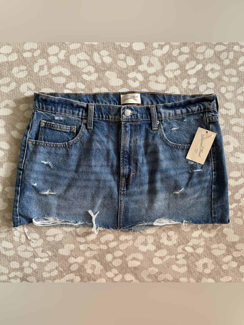 Universal thread size 14 denim mini skirt